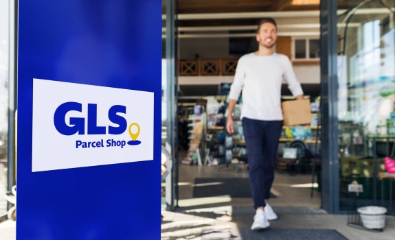 Man leaving a GLS Parcel shop Man leaving a GLS Parcel shop